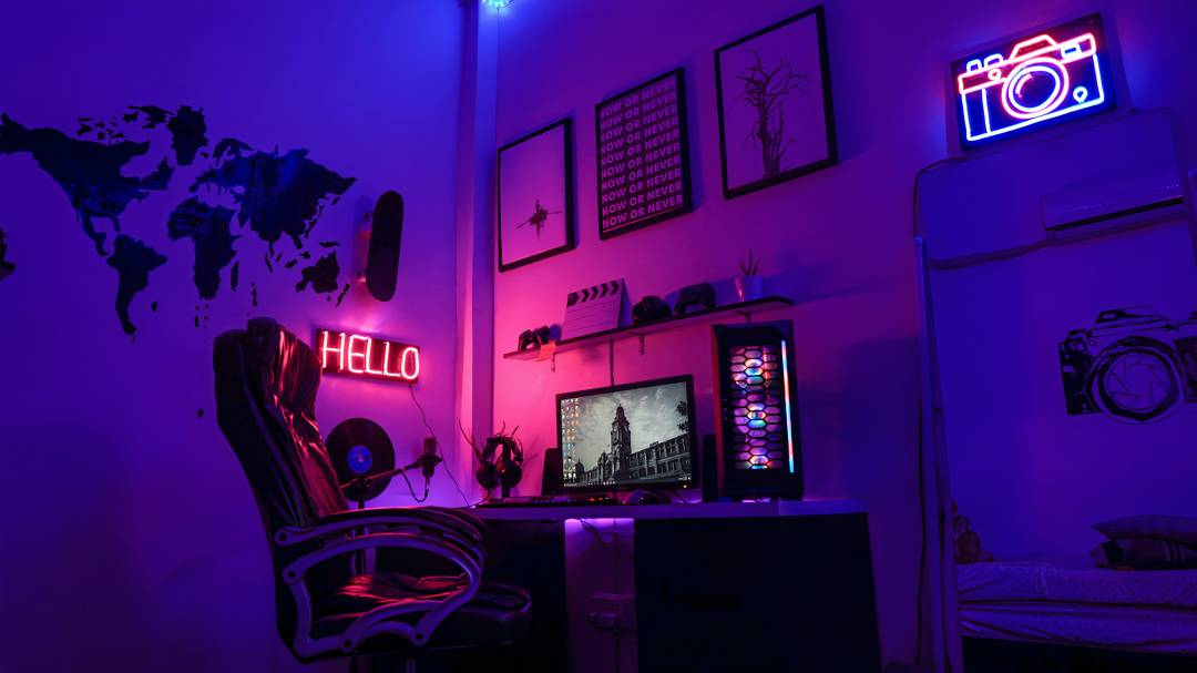 Dark Gaming Room With Desk Computer And Neon Lights