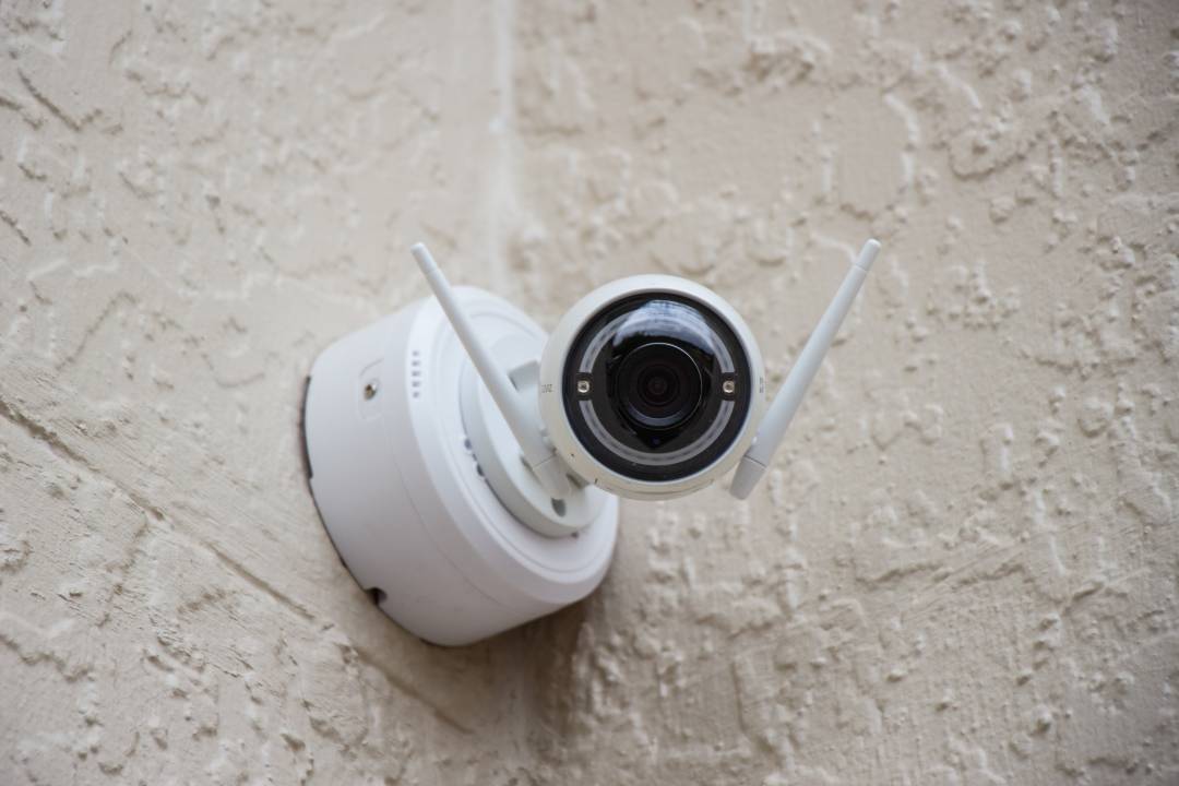 Security Camera With Antenna In A Corner Pointed At The Screen